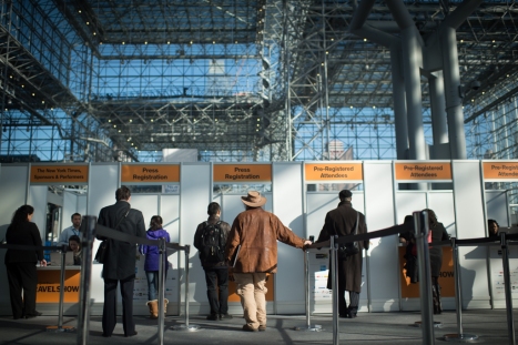 Attendees of the New York Times Travel Show begin to arrive on the opening day of the weekend long event in Manhattan at the Jacob Javits convention center. (Jan 23, 2015) Photo by Nancy Borowick