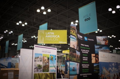 The New York Times Travel Show takes over one of the exhibition halls at the Jacob Javits convention center in Manhattan, filling it to the brim with stages, booths and all types of travel related experiences for the attendees of the show. (Jan 23, 2015) Photo by Nancy Borowick