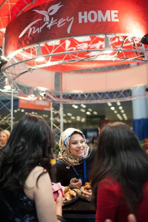Exhibitors and attendees connect and share information and expertise at the New York Times Travel Show in Manhattan at the Jacob Javits conference center. (Jan 23, 2015) Photo by Nancy Borowick